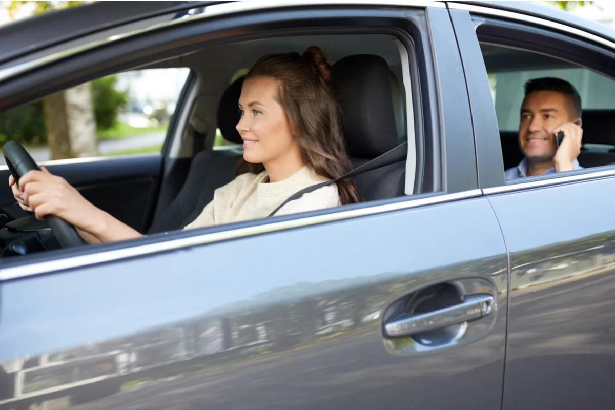 Women is driving taxi